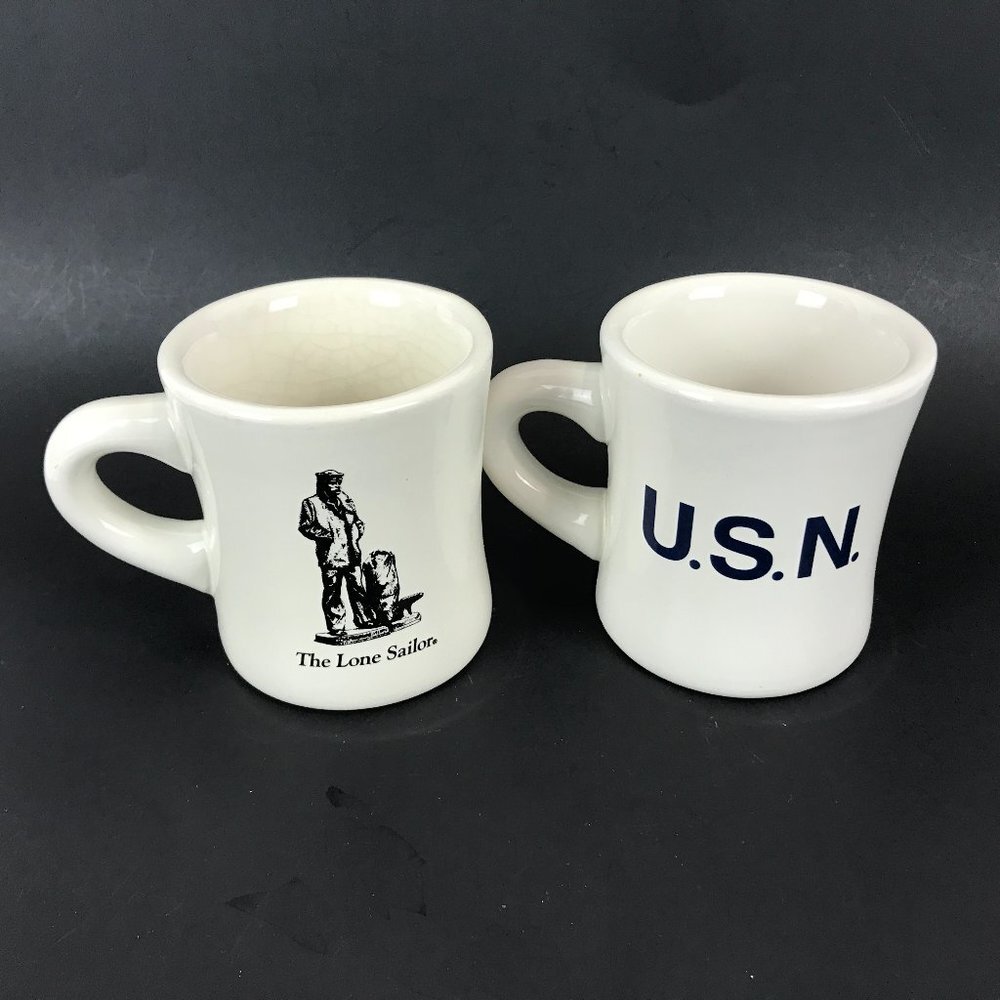 Two white Navy themed Mugs